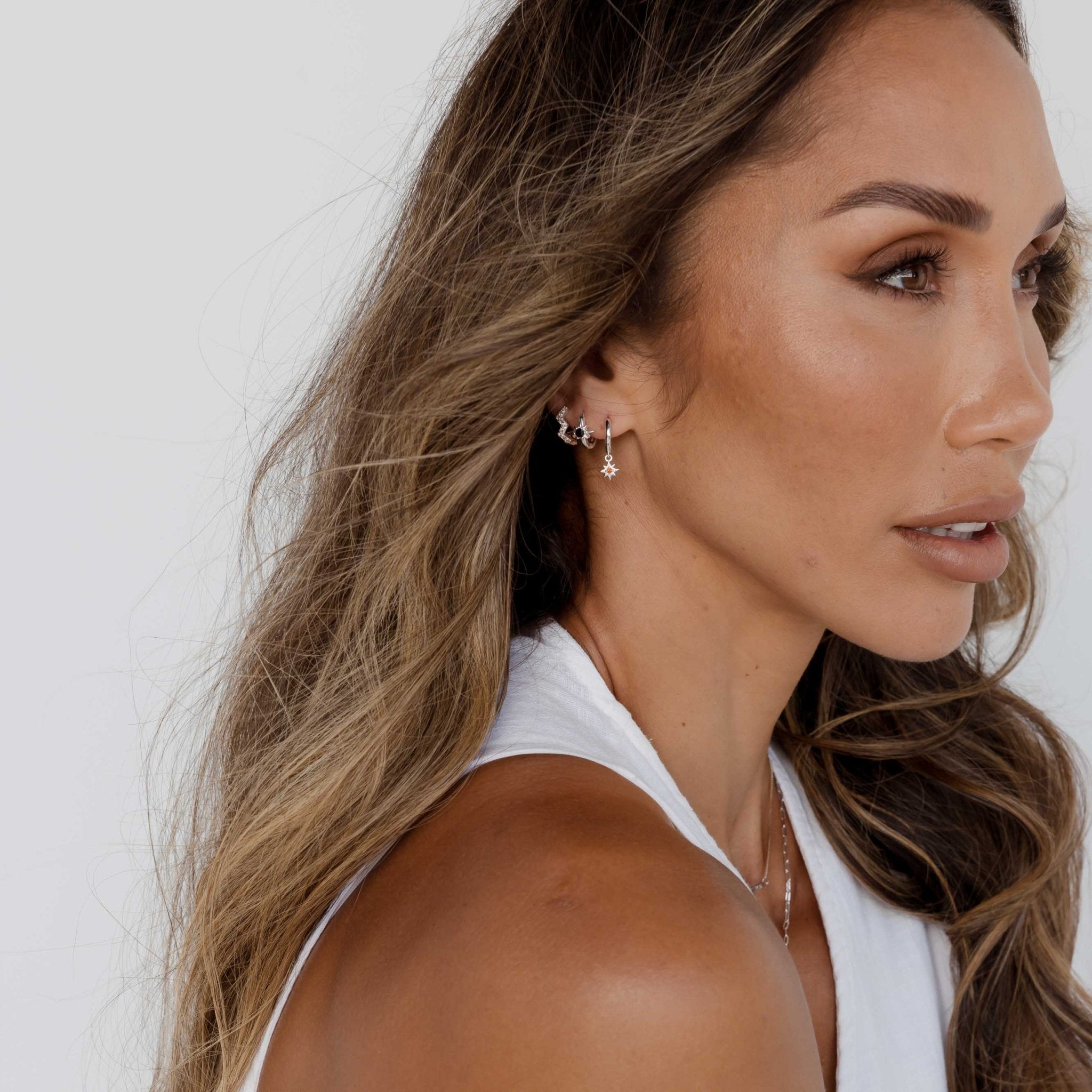 North Star Black Huggie Earrings - Camile & Stone